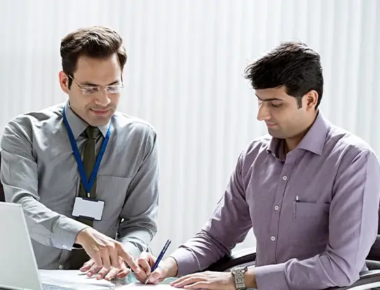Men Discussing Emerging & Mid-Corporate Business Loan